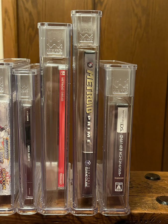Up-close side view for Switch, DVD-size, and DS holders